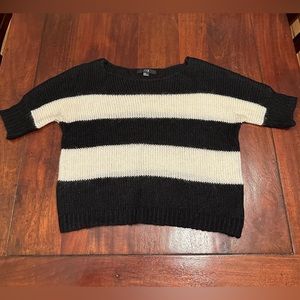 Women’s Black and White Woolen Sweater
Size M